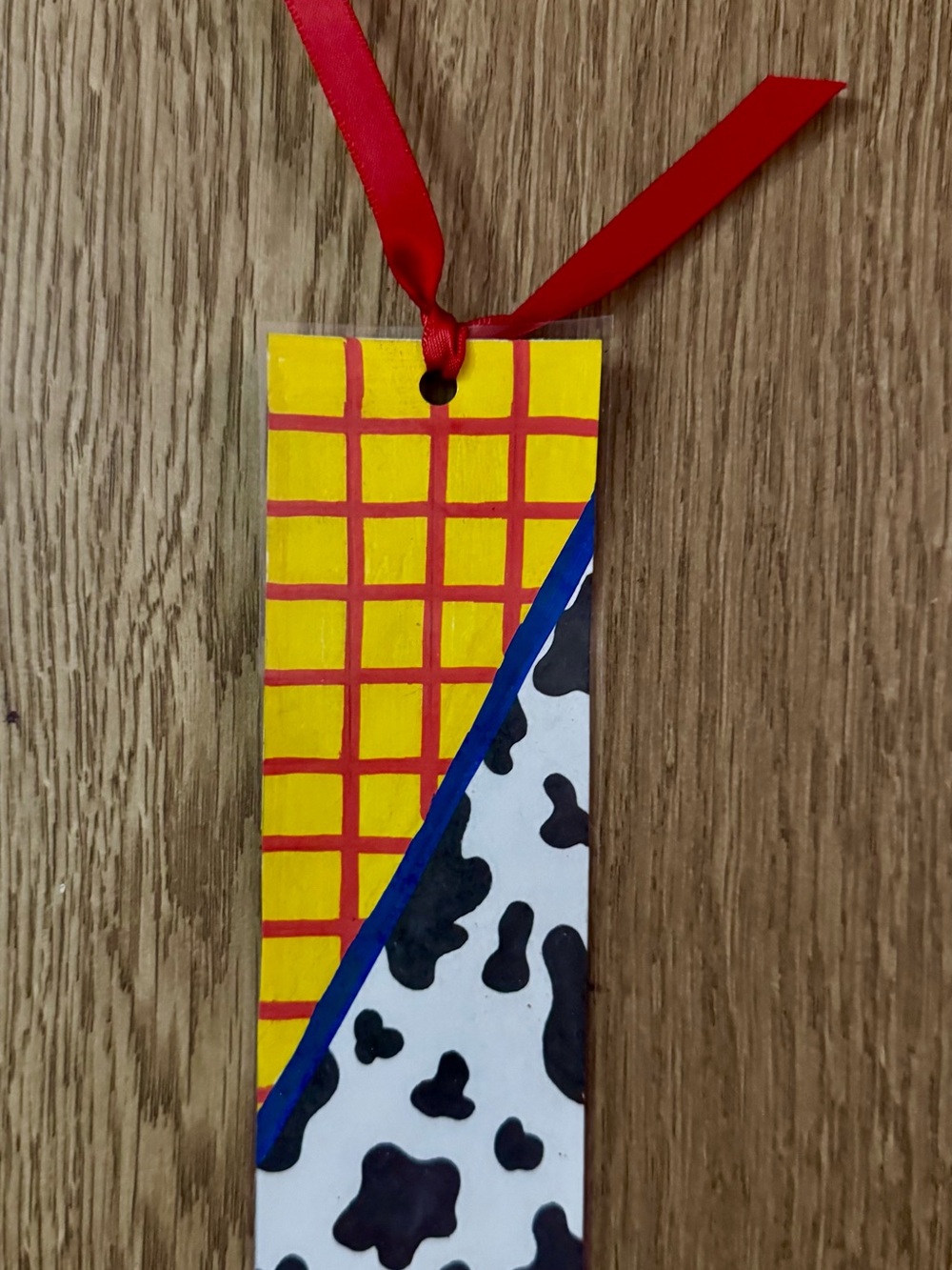 Hand painted and laminated Toy Story themed bookmark!
